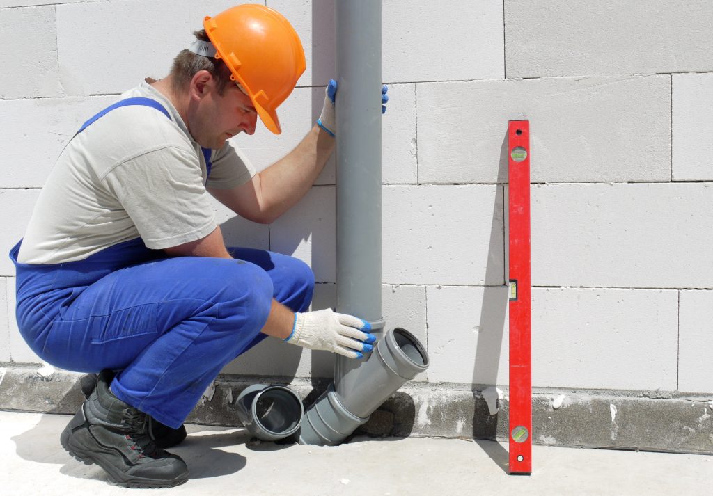 a plumber checking a plumbing issue